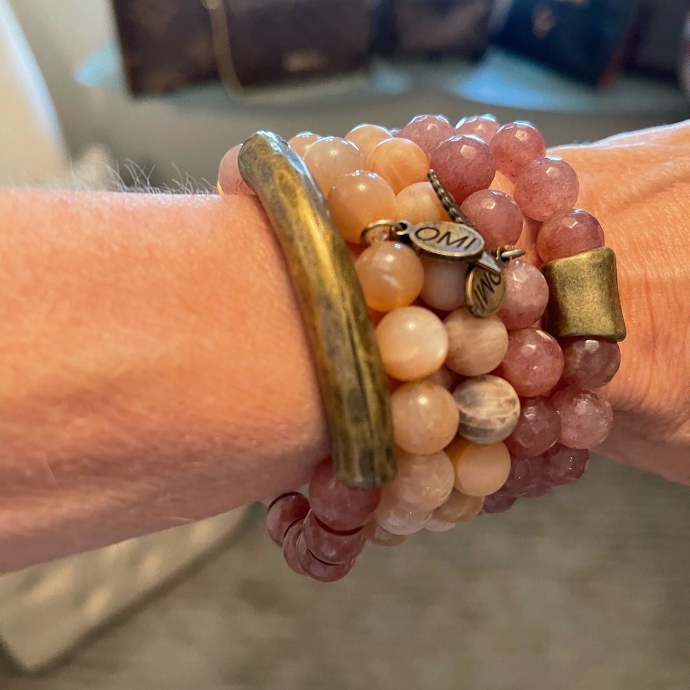 Natural stone and brass stretch bracelets.